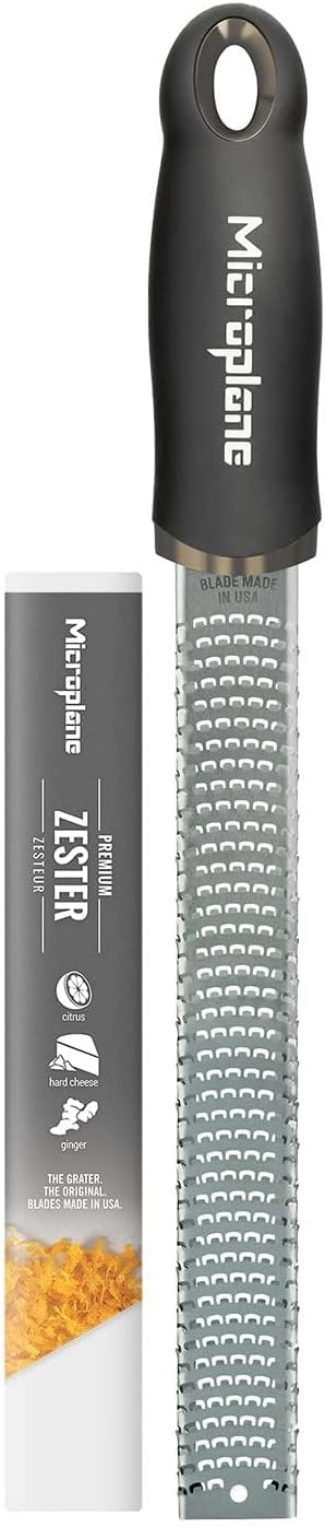 Microplane Zester Grater in Black for Citrus Fruits, Hard Cheese, Ginger, Chocolate and Nutmeg with Fine Stainless Steel Blade - Made in USA
